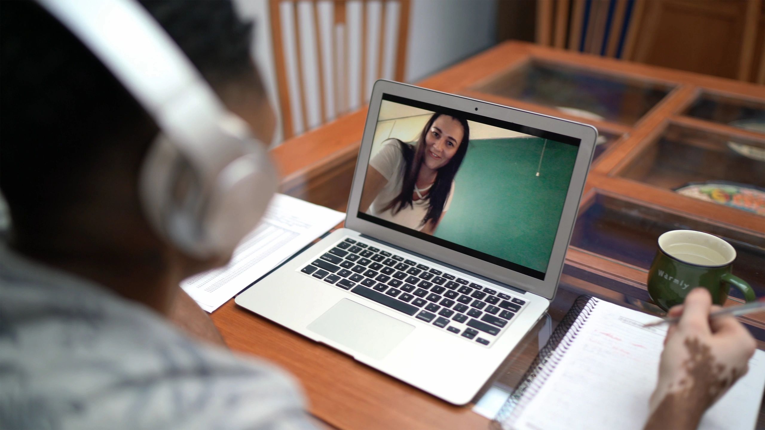 Student learning online on a laptop at home