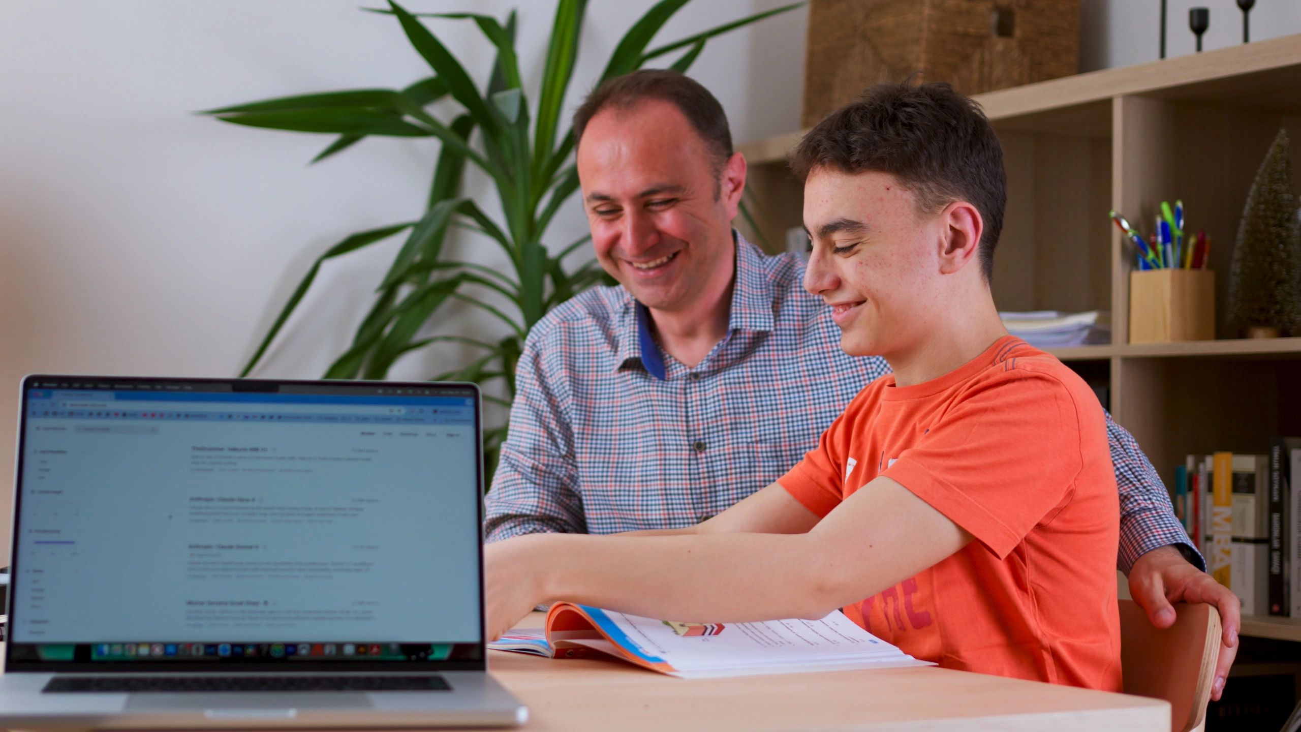 Parent supporting a student studying at home
